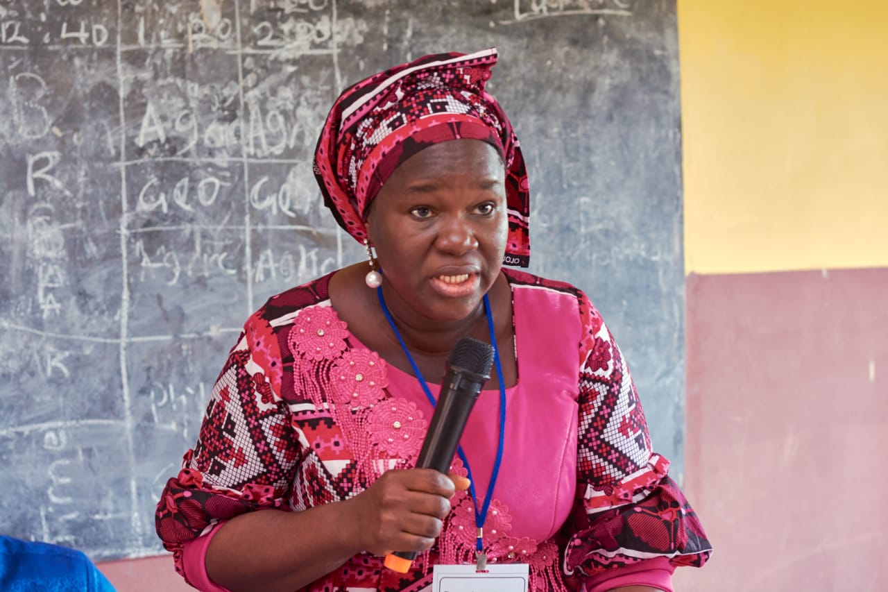 Students in uniform attentively listening