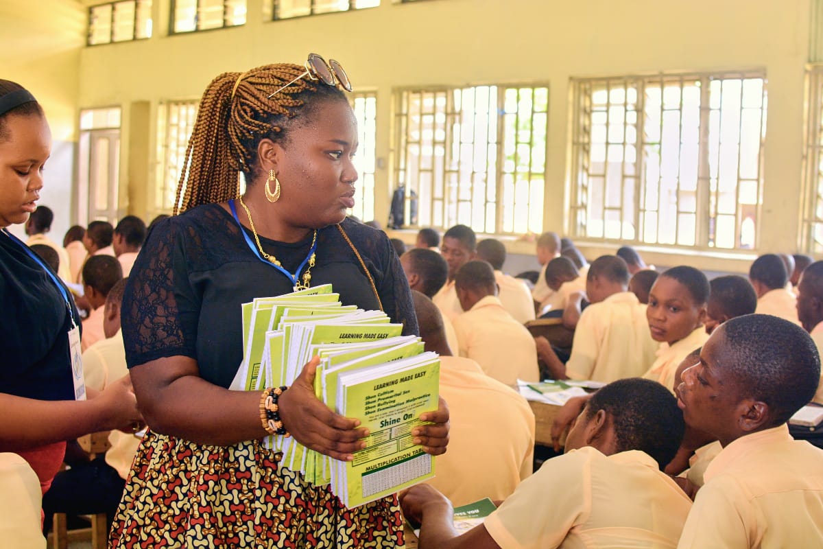 Two speakers presenting to audience