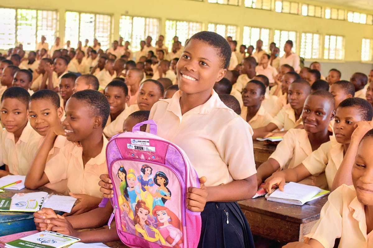 Man presenting materials at lectern